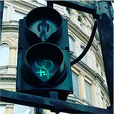 Traffic light with green sign for same-gender